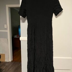 ASOS Black Maxi Jumpsuit with peep whole and button back.